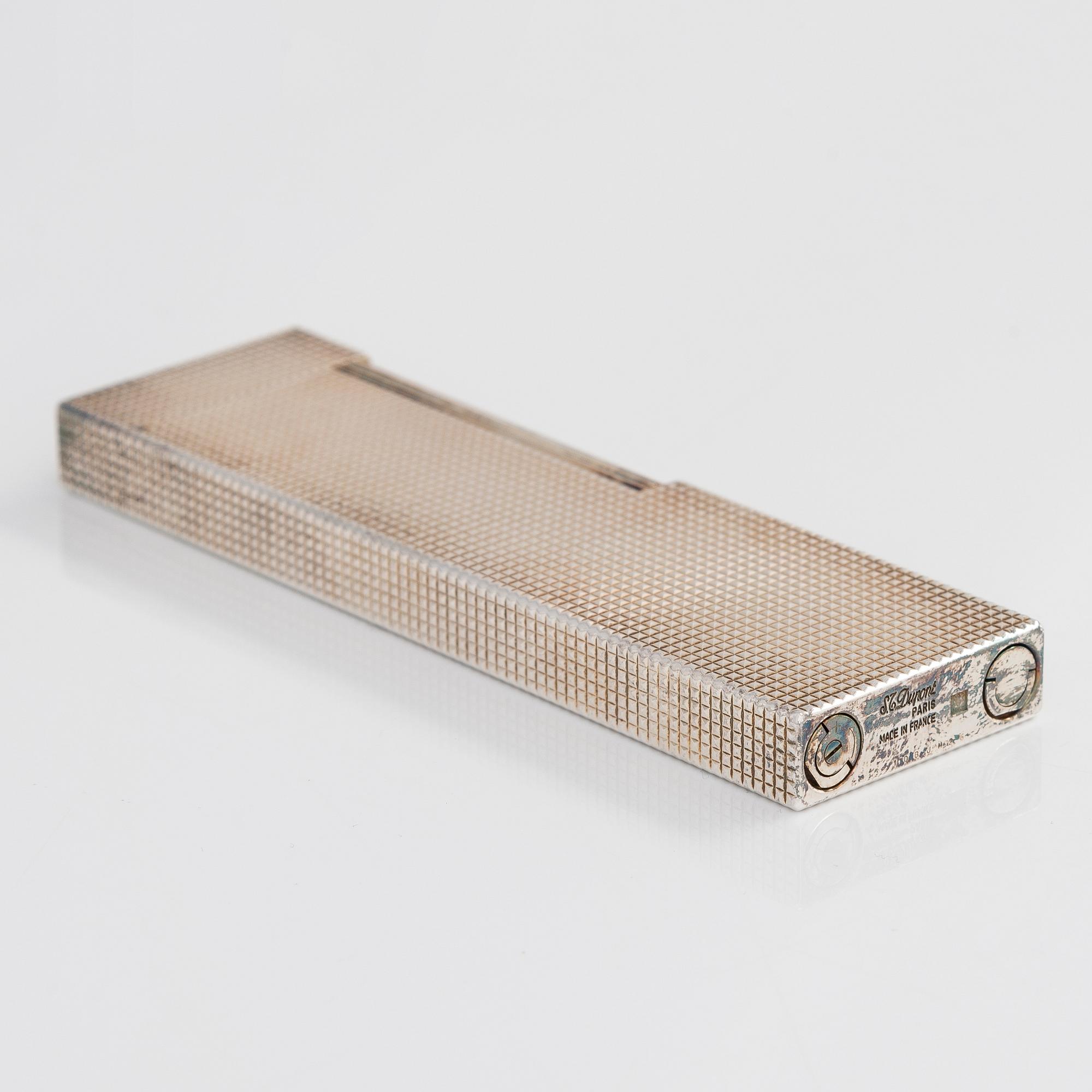 S.T. Dupont, a late 20th century table lighter.