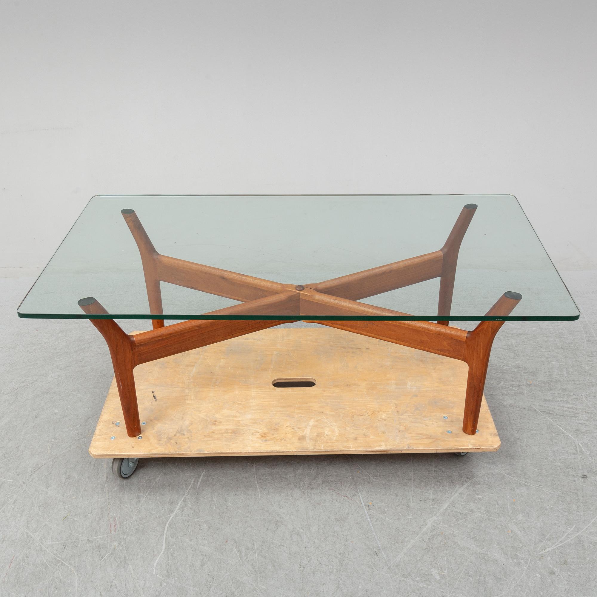 ALF SVENSSON, A teak and glass coffee table, mid 20th Century.