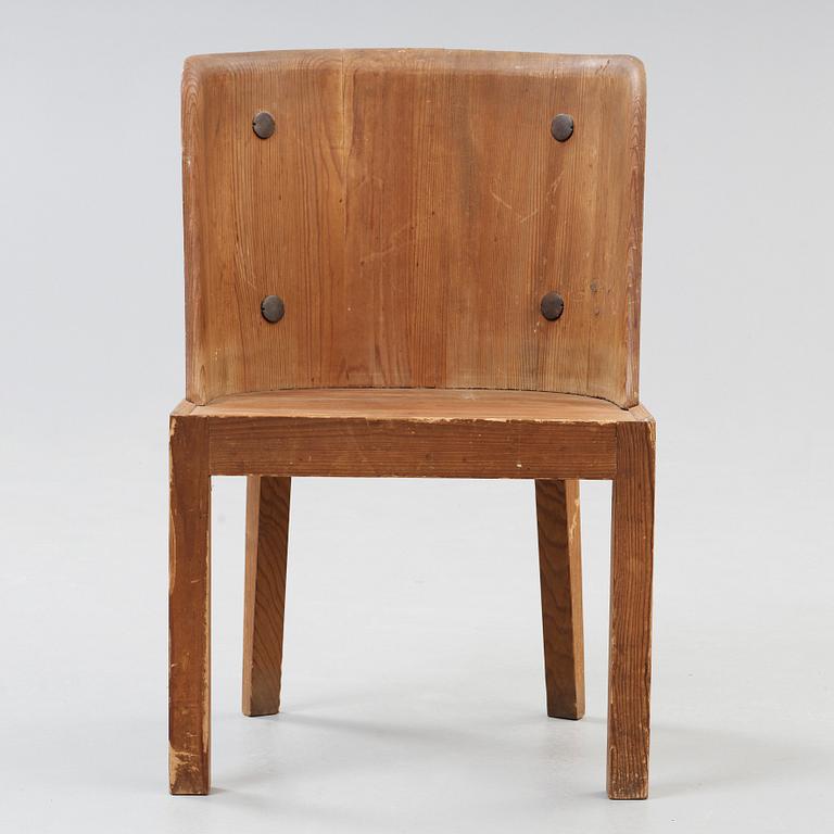 An Axel Einar Hjorth 'Lovö' stained pine armchair, Nordiska Kompaniet, Sweden 1930's.