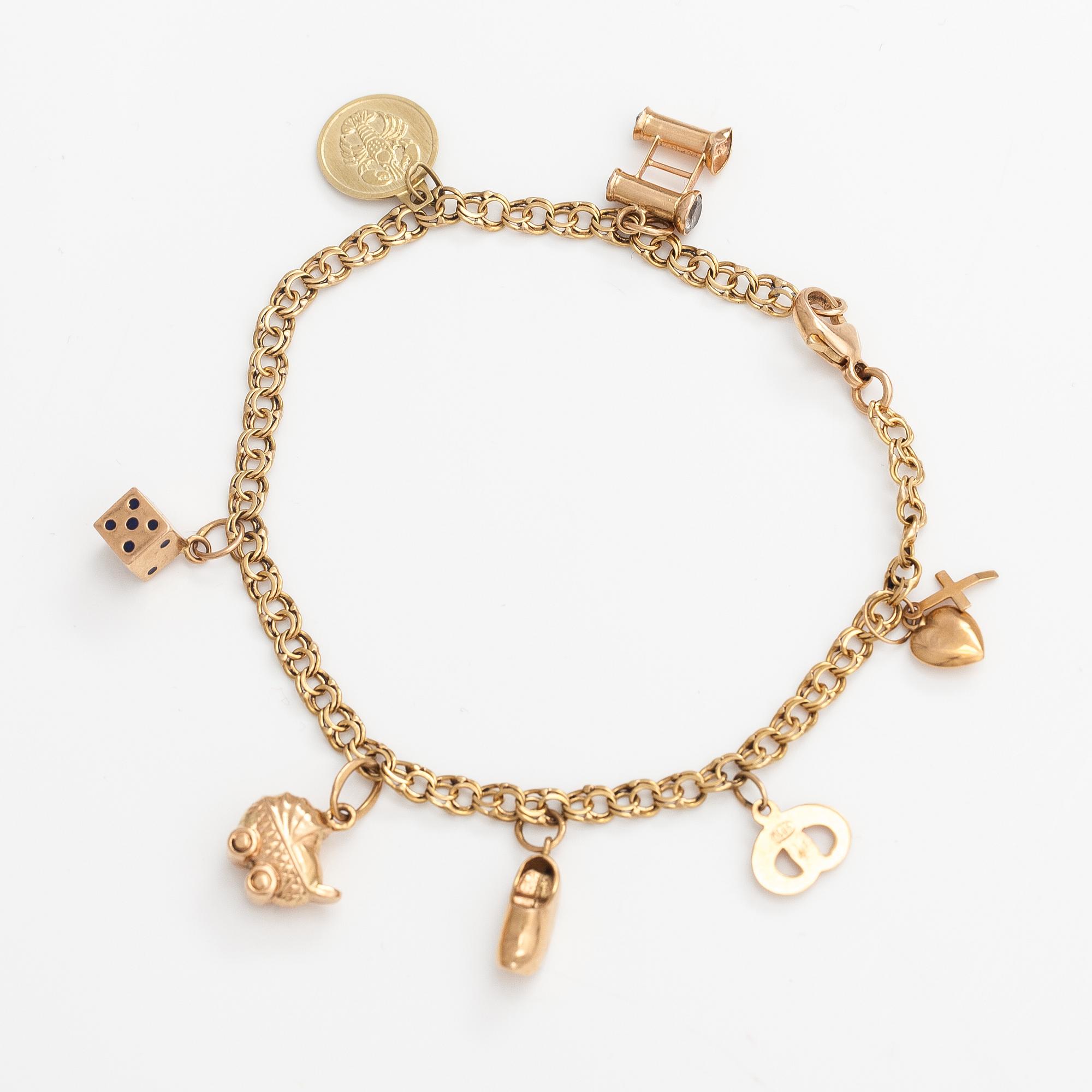 A 14K gold bracelet.