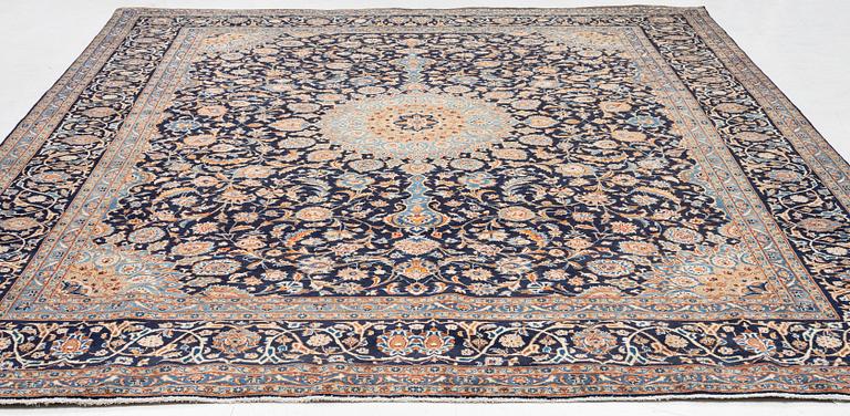 A Keshan rug, approx. 370 x 297 cm.