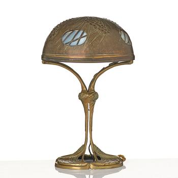 A bronze and brass table lamp, with signature Georges Leleu.