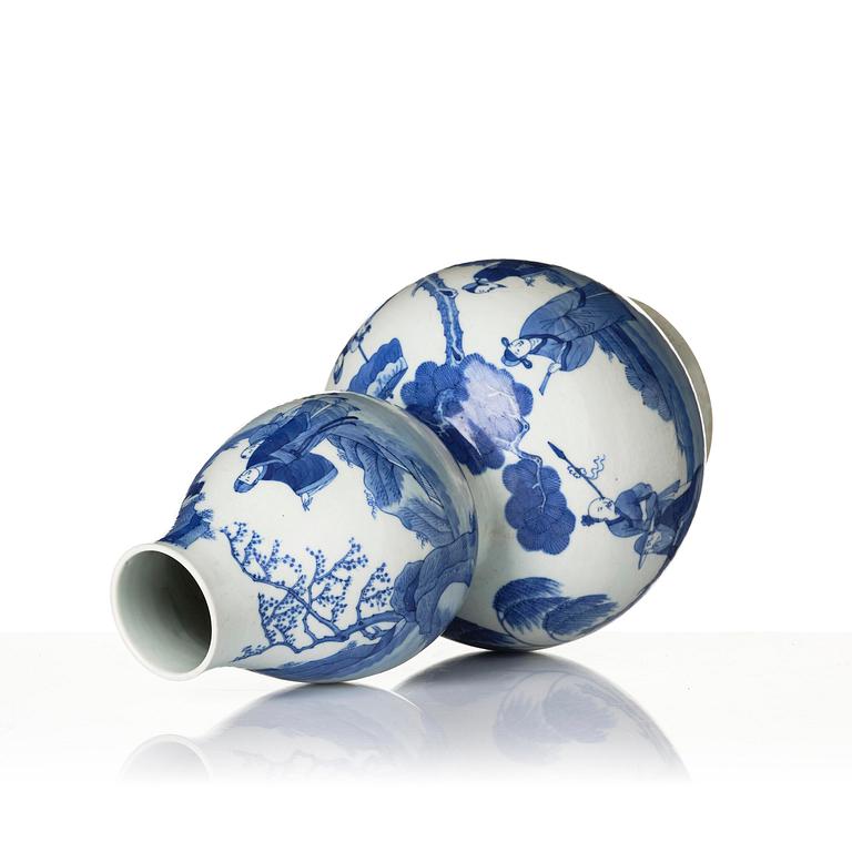 A large blue and white gourd-shaped vase, 20th century.