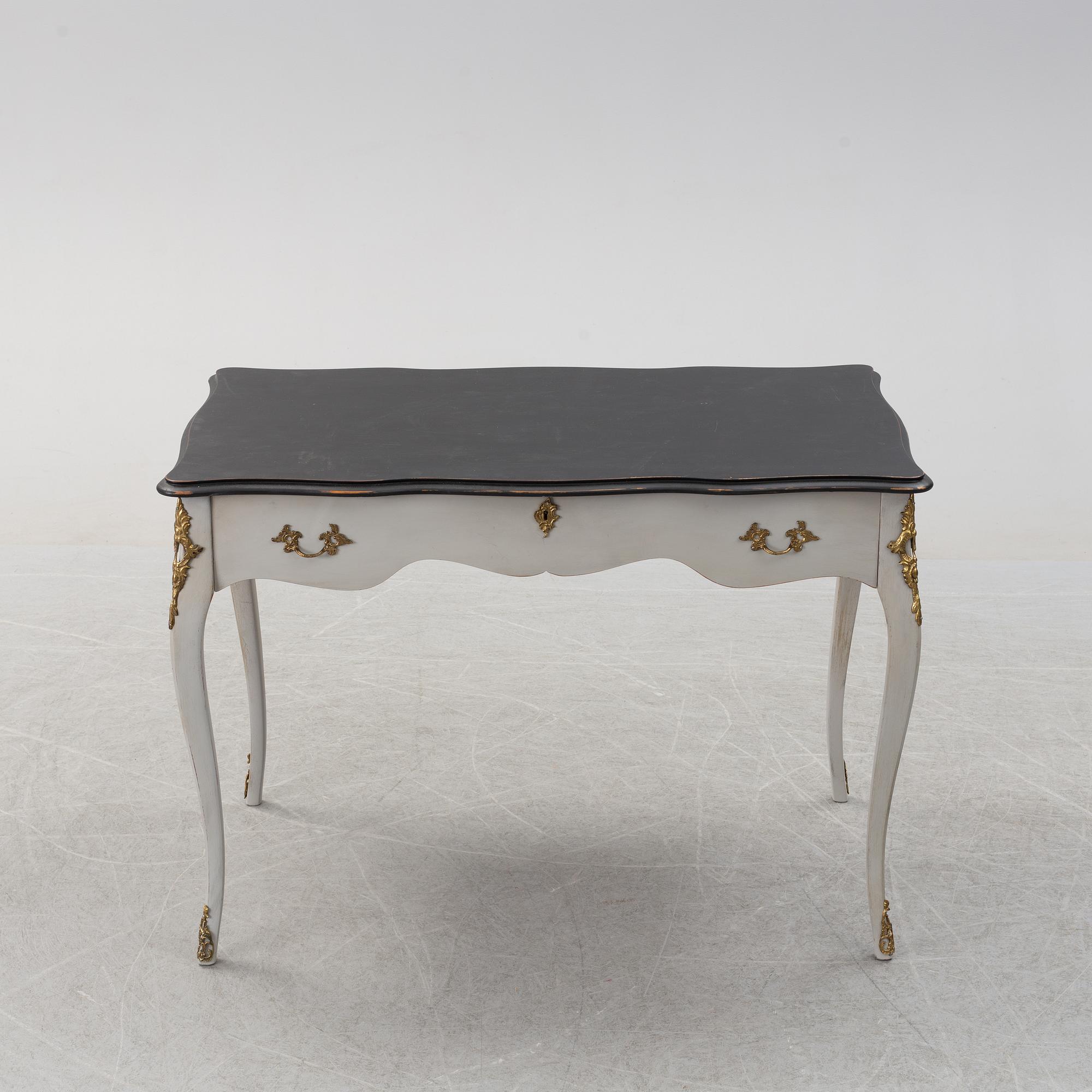 A rococo style table, mid 2th century.