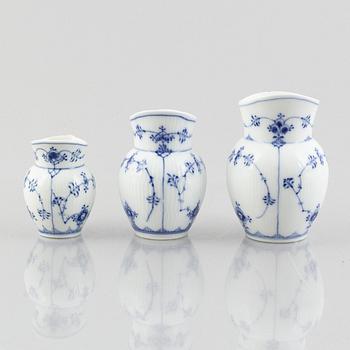 Three 'Blue Fluted Plain' / 'Musselmalet' porcelain jugs, Royal Copenhagen, 20th century.