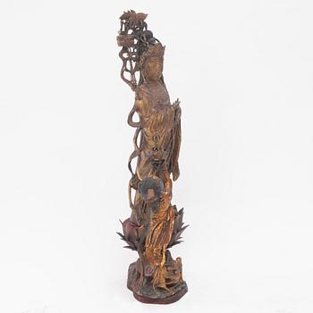 A large gilt and lacquer sculpture group, three parts, 20th century.