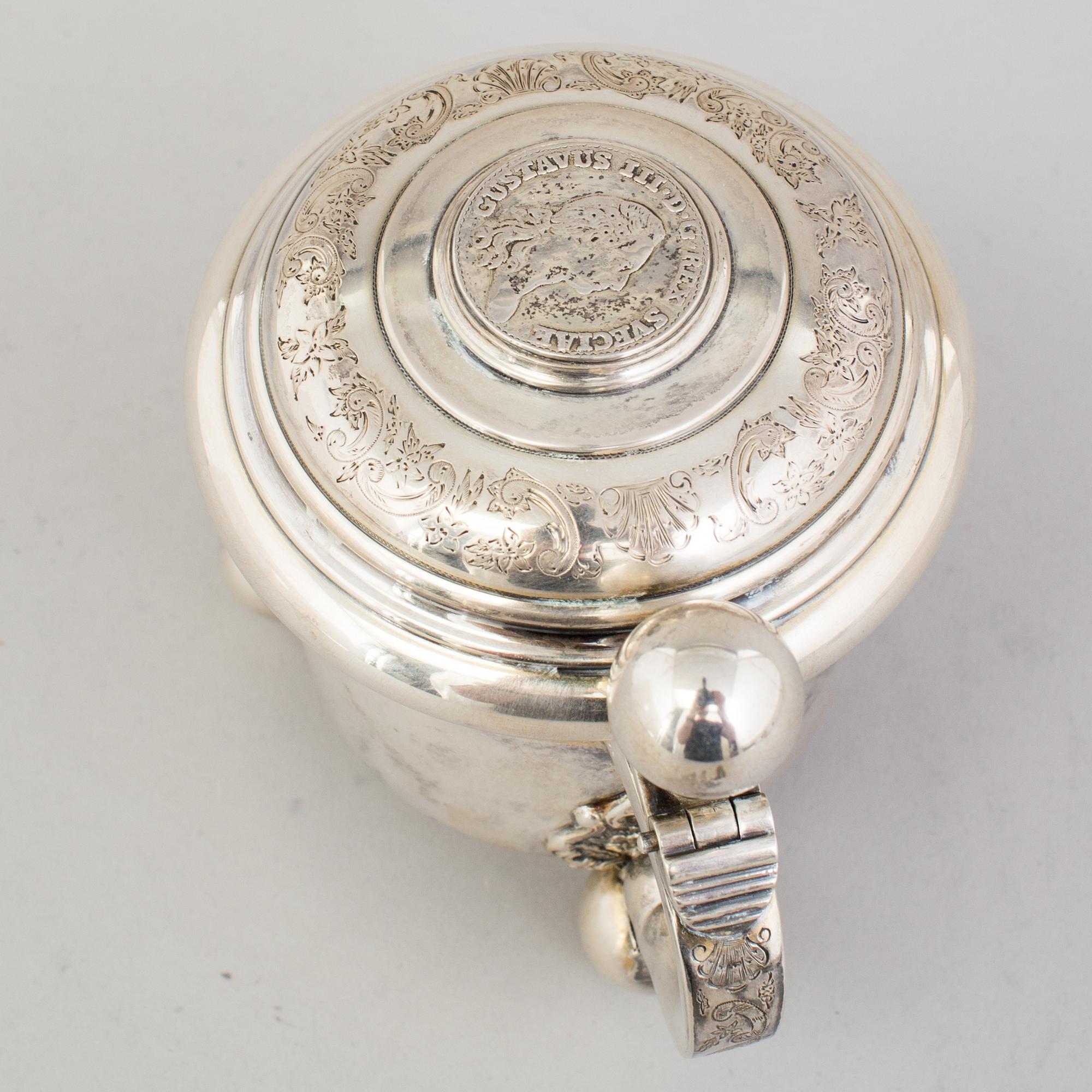 A 20th century parcel-gilt miniature tankard, mark of B Hertz AB, Stockholm 1910.