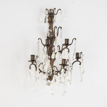 A pair of brass and cut glass five-light  baroque-style wall lights.