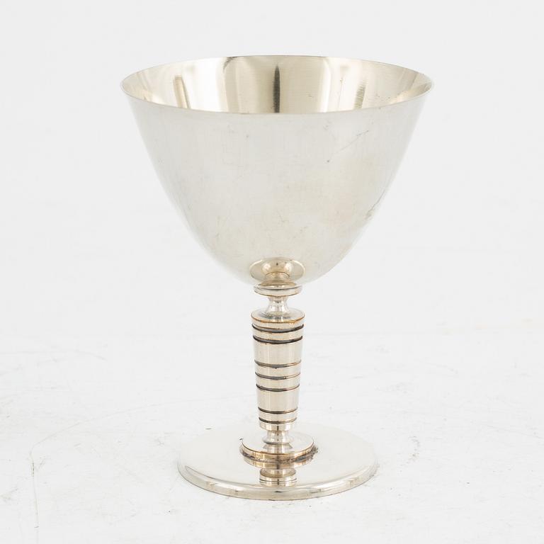 Folke Arström, eight silver plate cocktail glasses and a shaker, GAB.