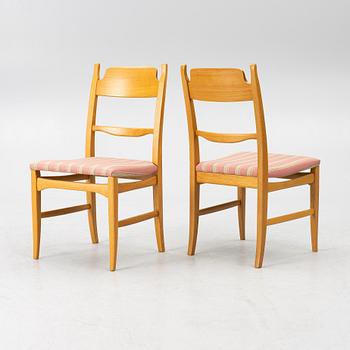 Carl Malmsten, a dining table with eight chairs, 'Camlare Nyckel', Sweden, second half of the 20th century.