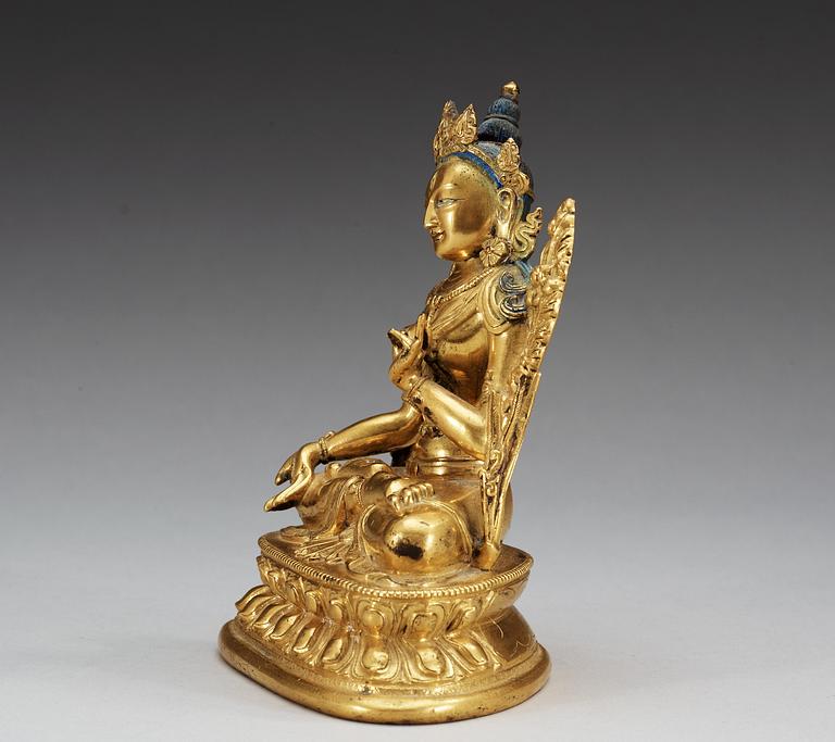 A gilt bronze Sino-Tibetan figure of White Tara, 19th Century.