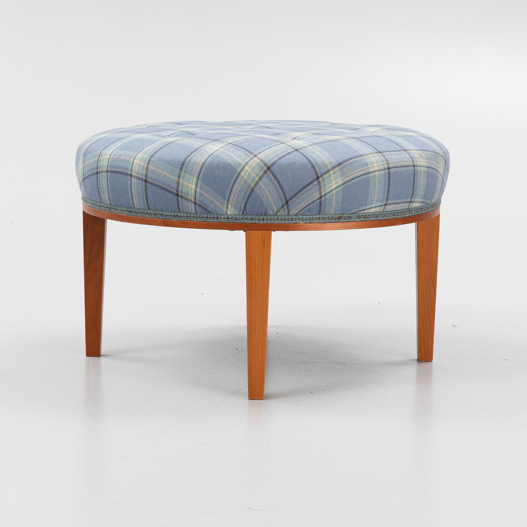 Josef Frank, a model 647 cherry wood stool by Firma Svenskt Tenn.