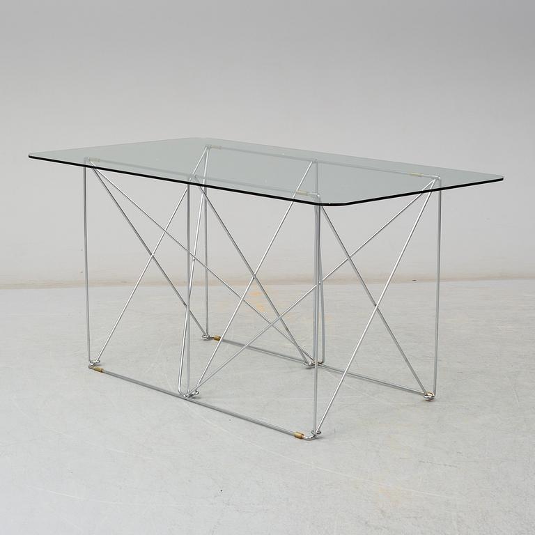 A glass dining table by IKEA.