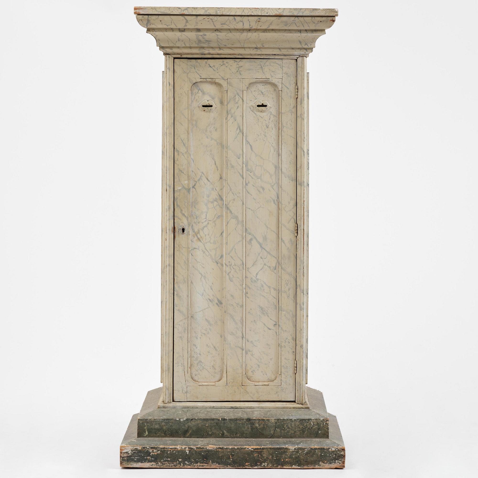 A Swedish column-shaped cabinet 19 th century.