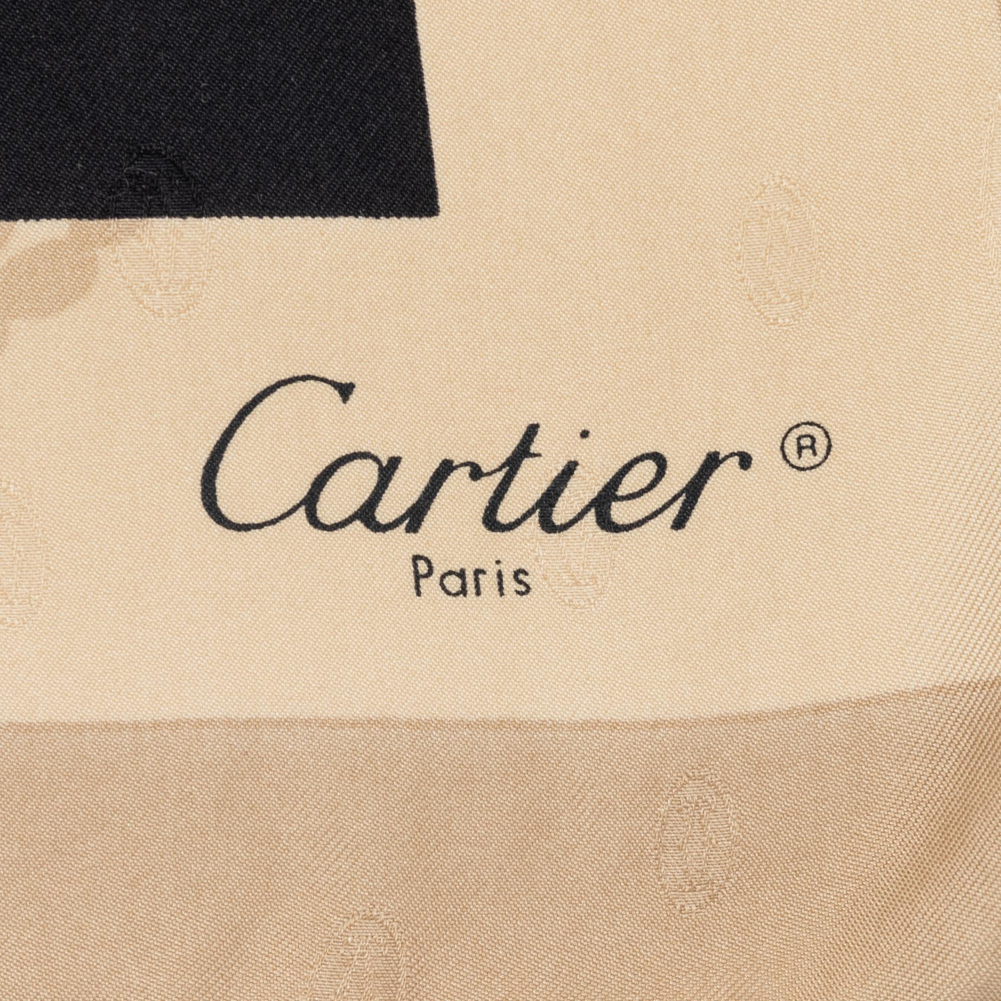 Cartier, a jacquard silk scarf.