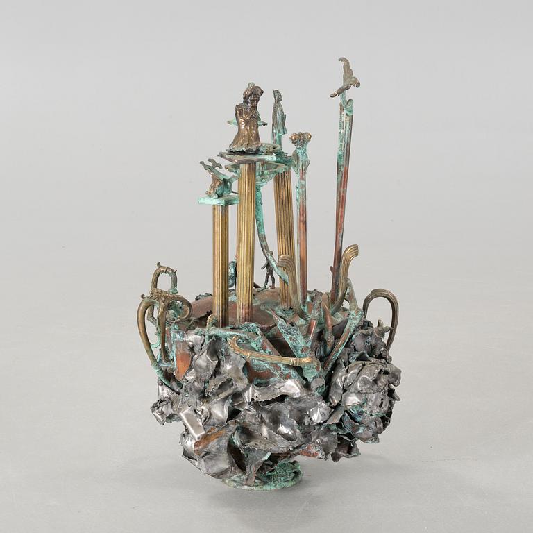 a metal sculpture, signed and dated 1980.