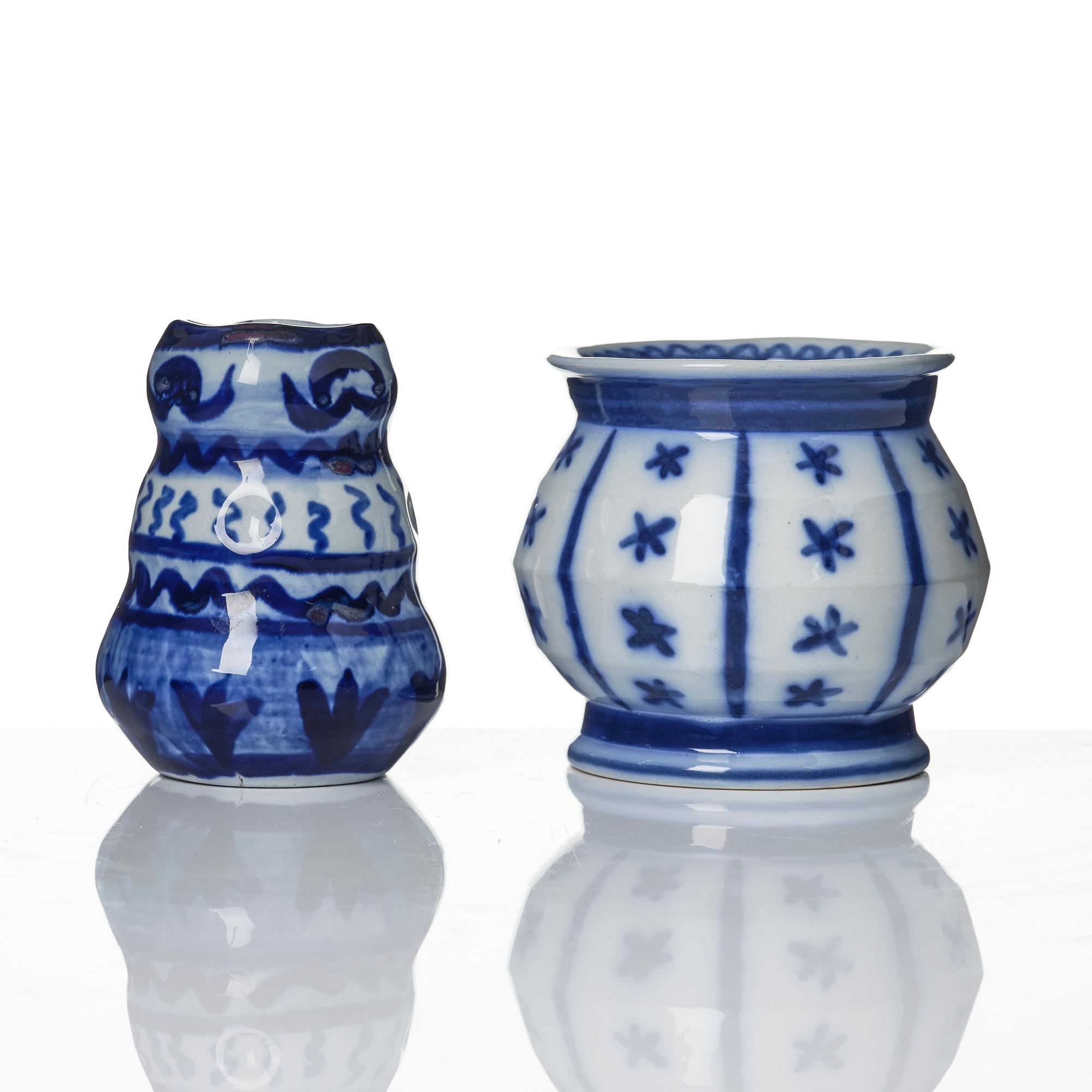 Wilhelm Kåge, a jar with cover, and four vases, creamware and porcelain, Gustavsberg, Sweden, 1917-1920.