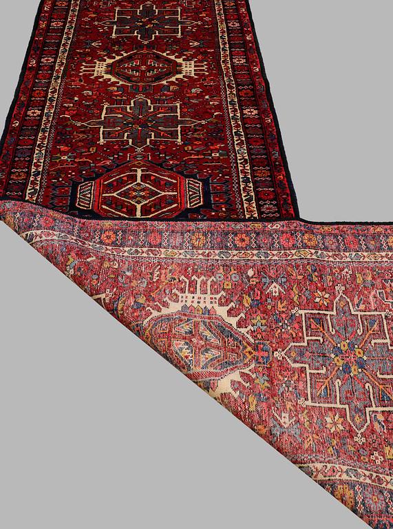 A SEMI-ANTIQUE KARADJA RUNNER, AROUND 320 x 100 cm.
