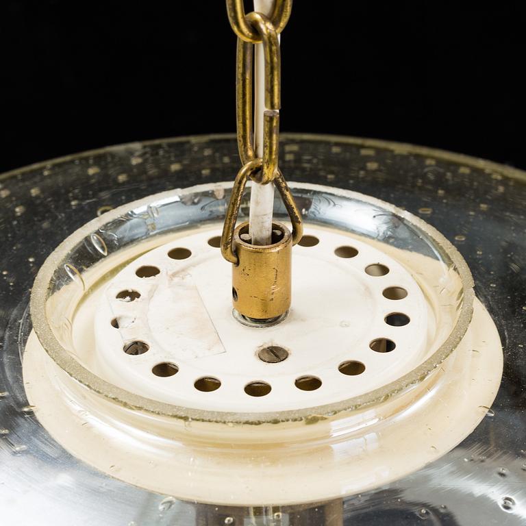 A 1960/70s glass and brass ceiling lamp.