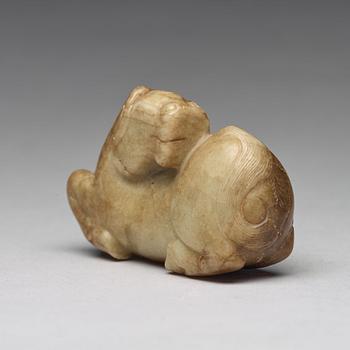 A carved nephrite figure, Ming dynasty (1368-1644).