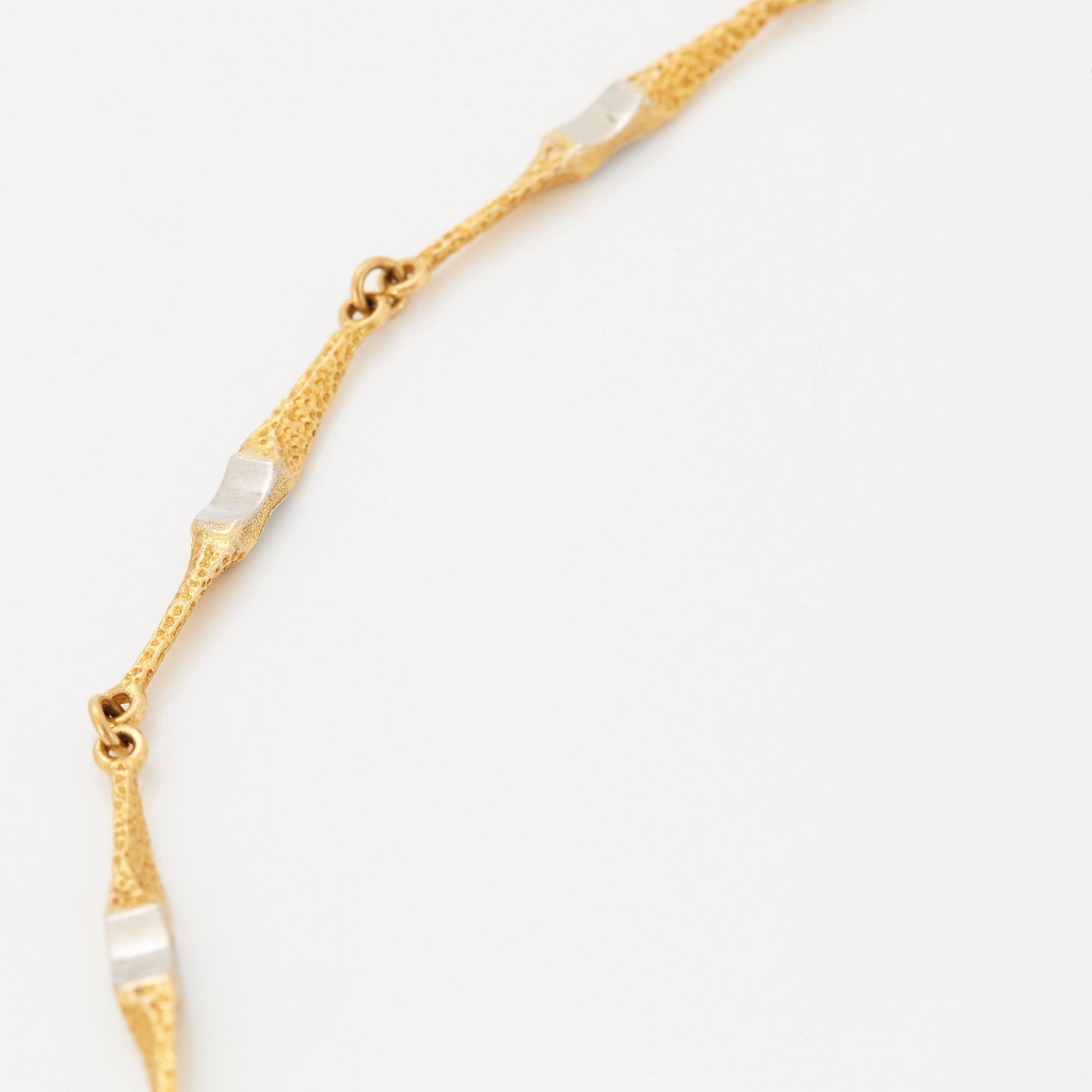 Lapponia collier 18K guld och platina.