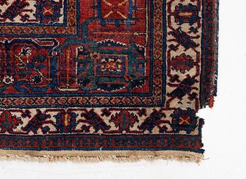 An oriental carpet, c. 360 x 270 cm.