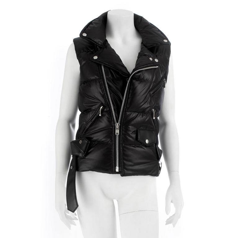 JUNYA WATANABE Comme des Garçons, a black down filled vest with leather details, size S.