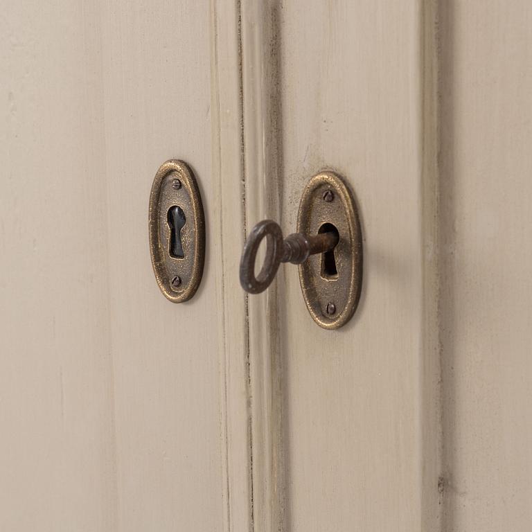 A cupboard, early 20th Century.