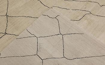 A Moroccan carpet, 305 x 251 cm.