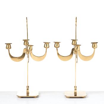 Josef Frank, a pair of brass candelabra by Svenskt Tenn, Sweden 1950's, model nr 2663.