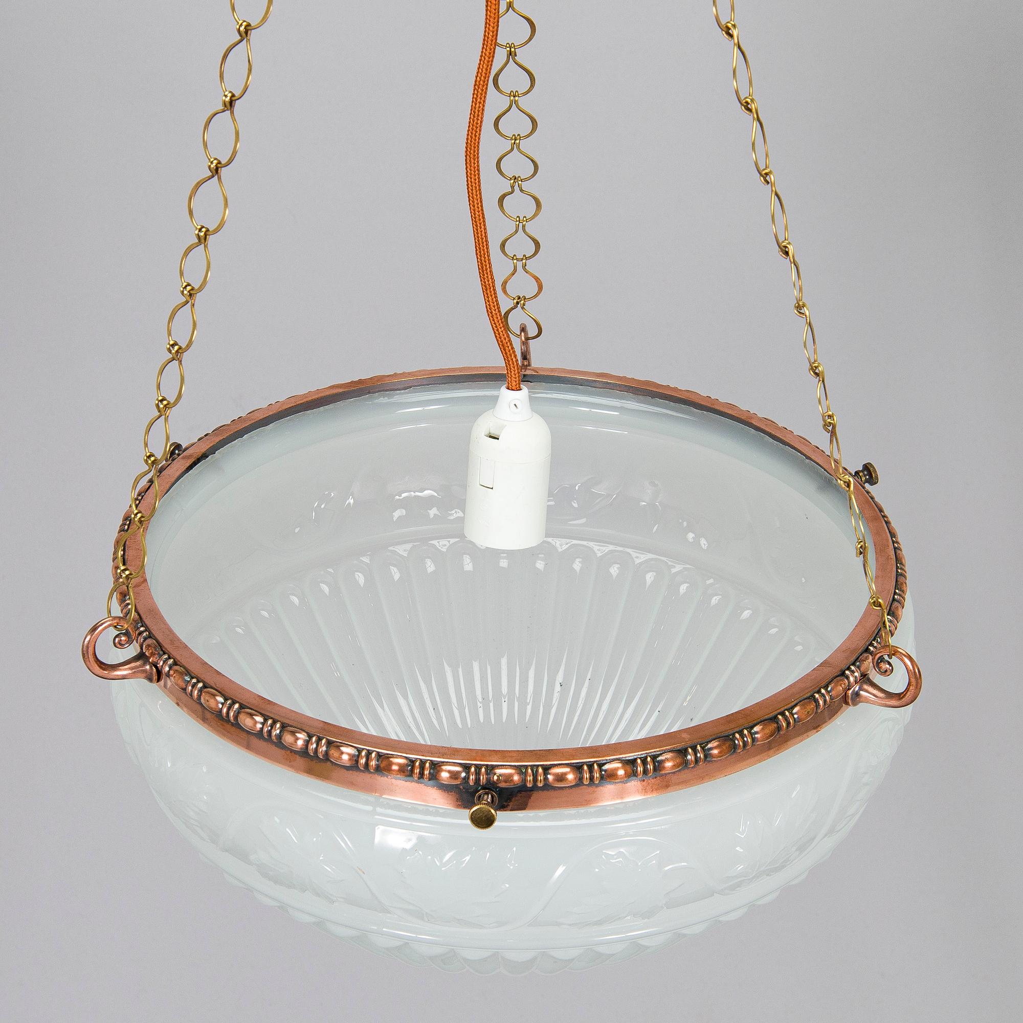 Kattovalaisin, 1900-luvun alku.