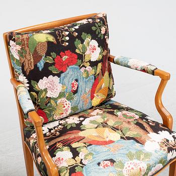 Josef Frank, two mahogany and rattan armchairs, model 969, Firma Svenskt Tenn.