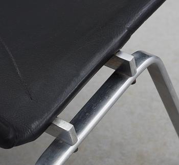 A Poul Kjaerholm "PK-22" black leather and steel easy chair, E Kold Christensen.