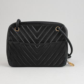Chanel, a black leather handbag, 1980's.