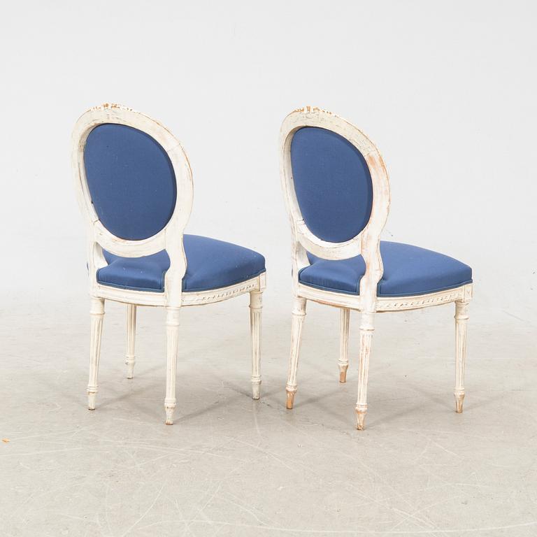 A pair of painted Louis XZVI style chairs first half of the 20th century.