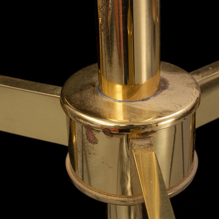 A brass chandelier with two glass globes by Hans-Agne Jacobsson, Markaryd.