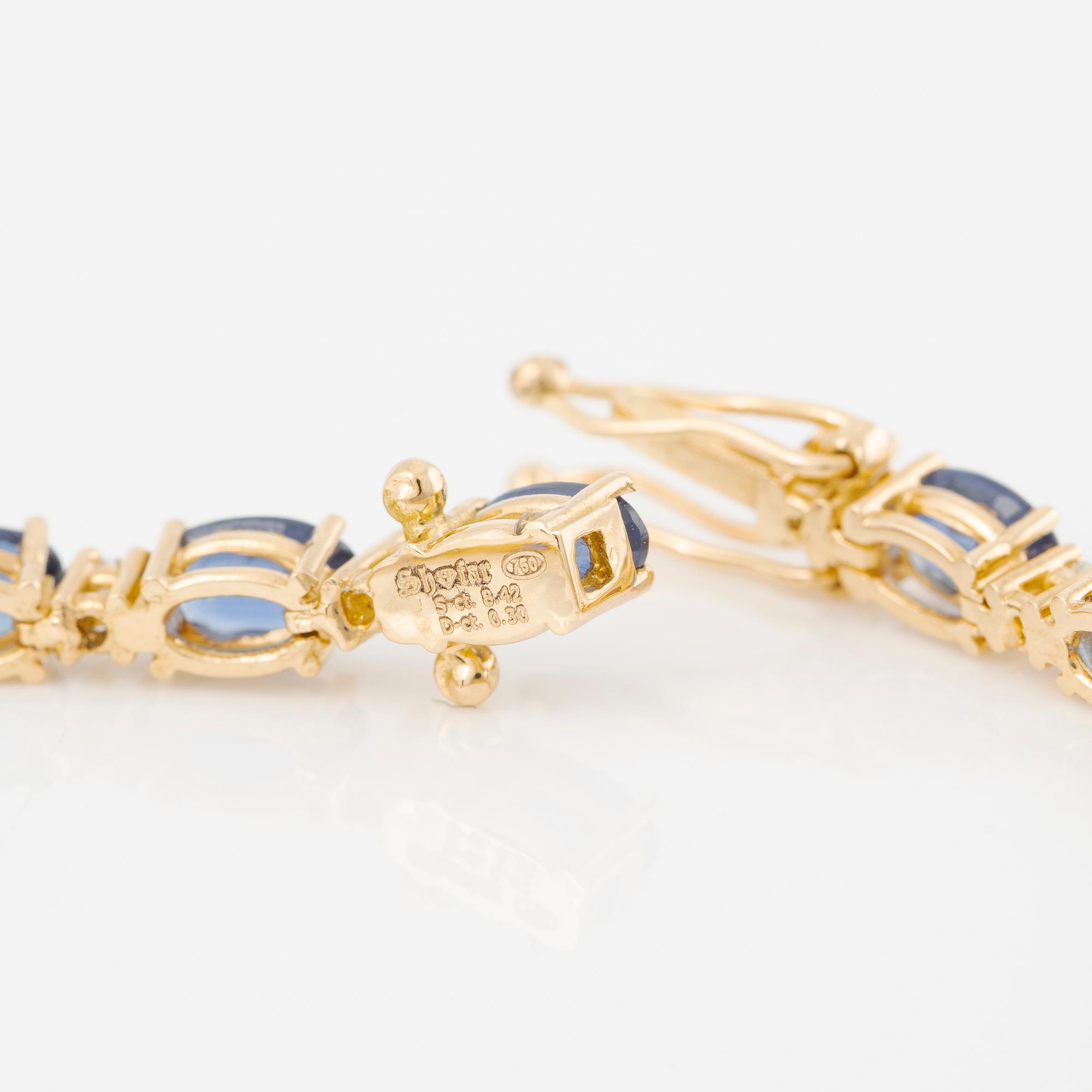 Bracelet 18K gold with oval-cut sapphires and brilliant-cut diamonds.