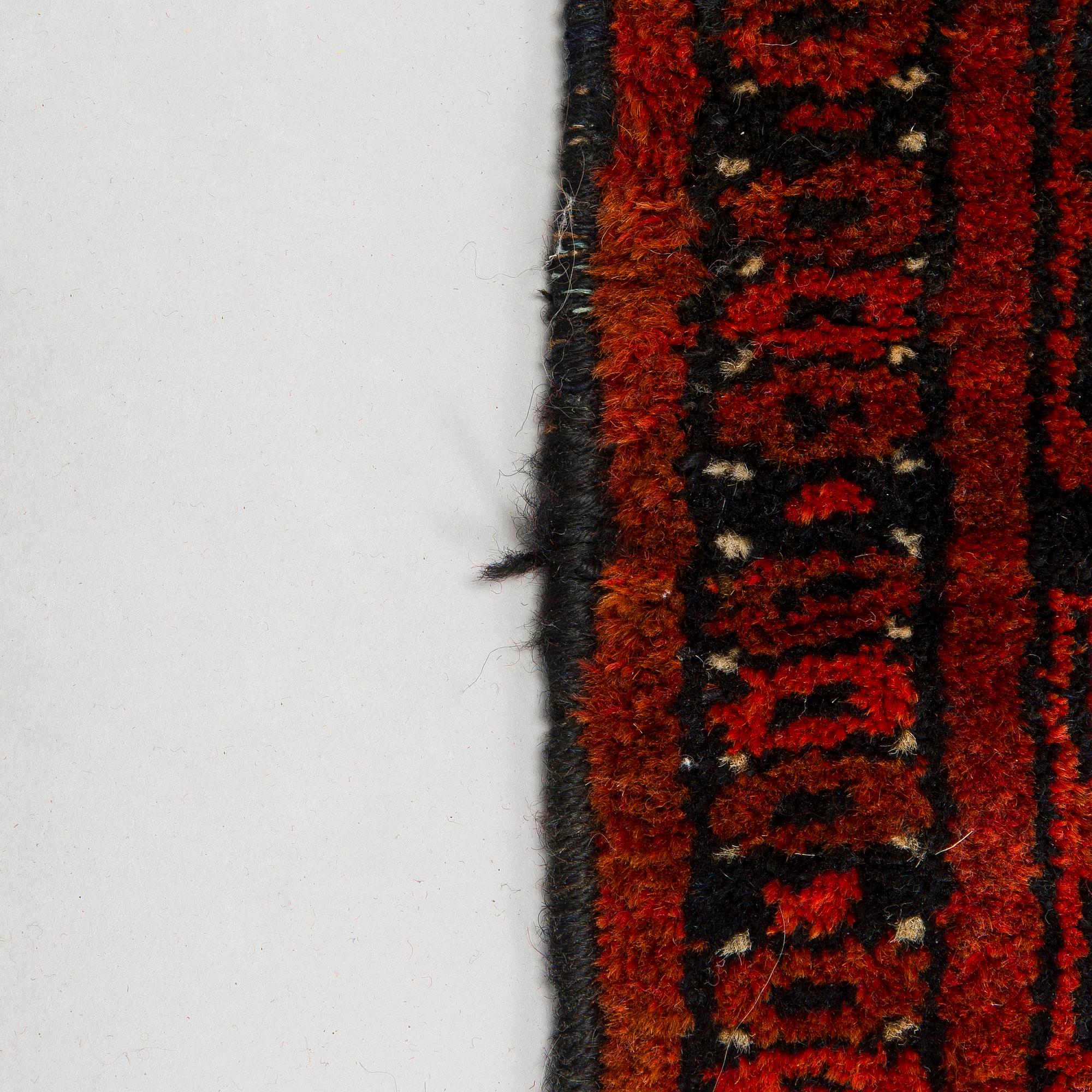 Carpet, Afghan. Approx. 219cm x 106cm.