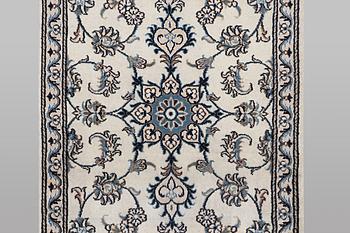 A runner carpet, Nain, part silk, ca 197 x 77 cm.