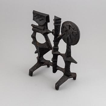 OLLE HERMANSSON, a cast iron sculpture, marked Husqvarna.
