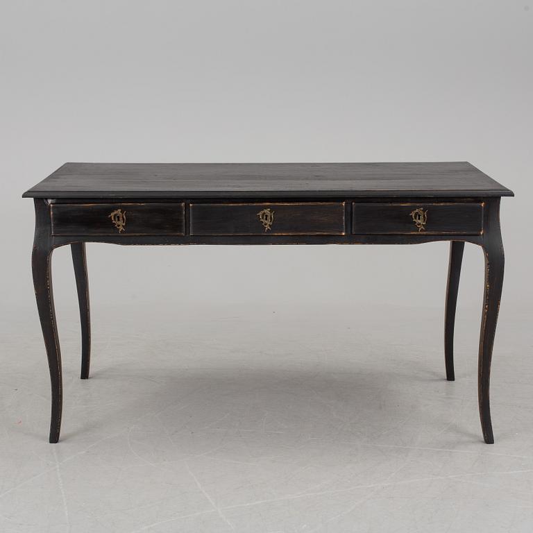 A partially rococo, 18th century writing desk.