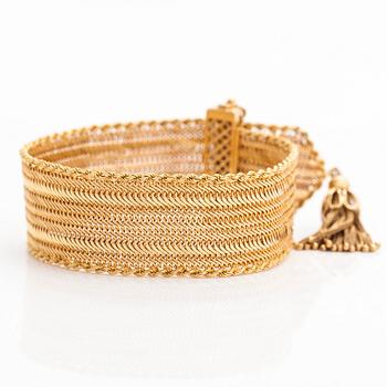 An 18K gold and synthetic rubies bracelet, Italy.