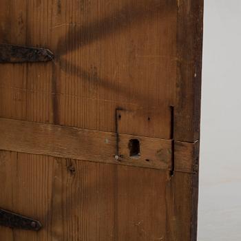An early 19th century wall cabinet.