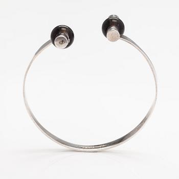 Elis Kauppi, A sterling silver bracelet with smoaky quartz pearls. Kupittaan kulta, Turku.