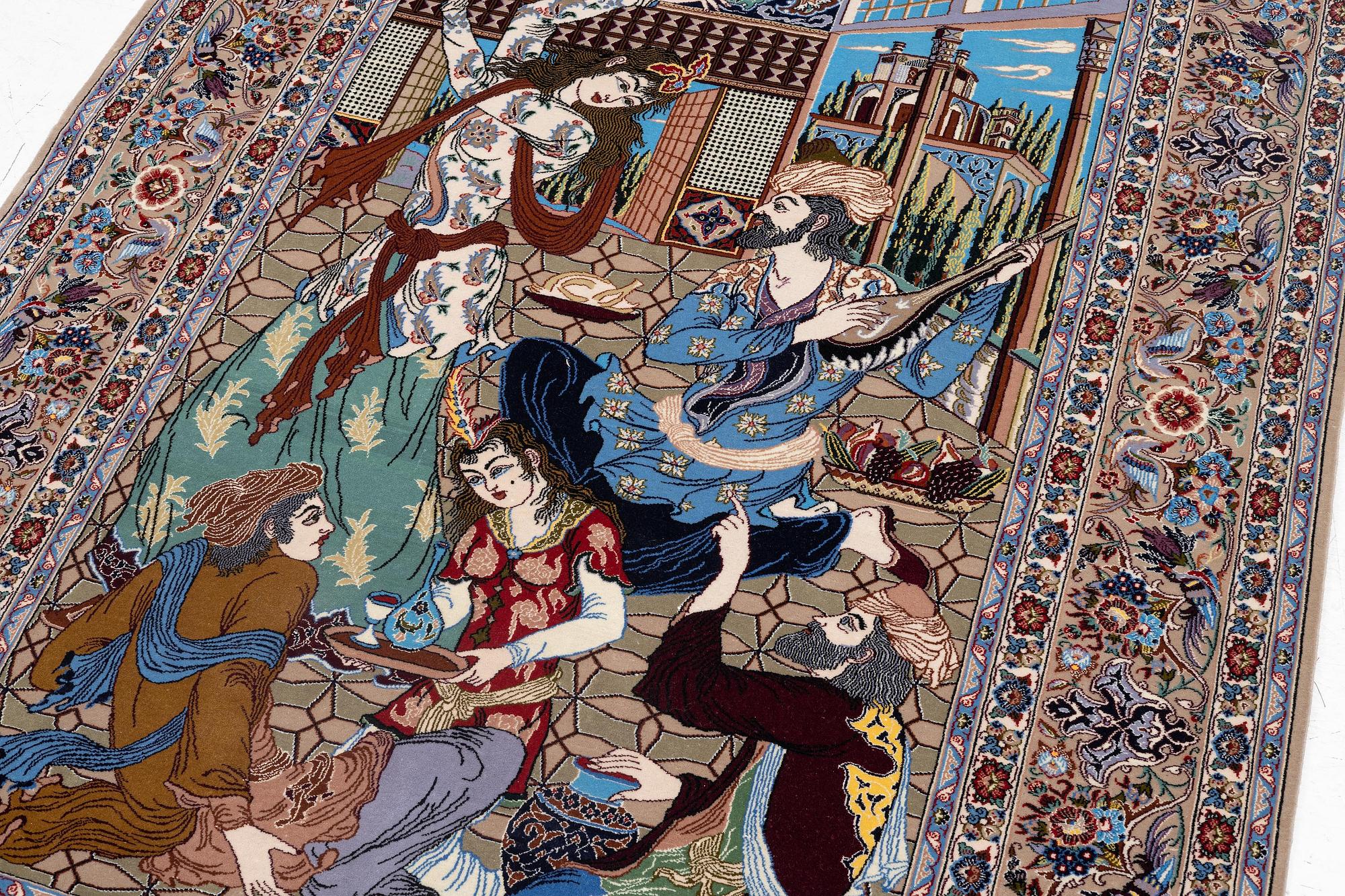 A pictoral Isfahan rug, part silk, c. 241 x 155 cm.
