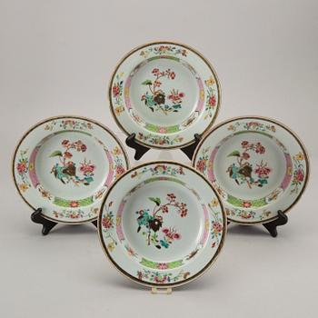 A set of four Chinese famille rose Qianlong porcelain plates.