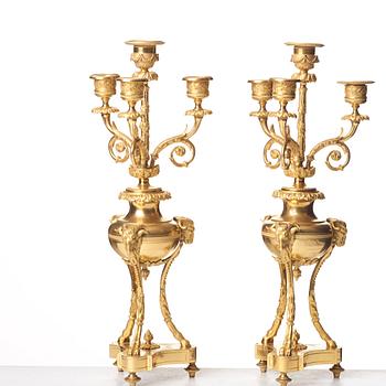 A pair of French Louis XVI-style four-light candelabra, second half of the 1800's.