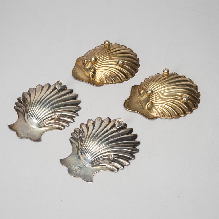 Two pairs of silver butter-shells, mark of Sheffield 1899, Birmingham 1905, & London 1914.