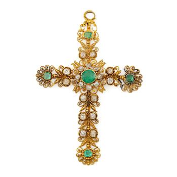 504. A cross in 14K gold set with faceted emeralds and old-cut diamonds, likely 18th century.