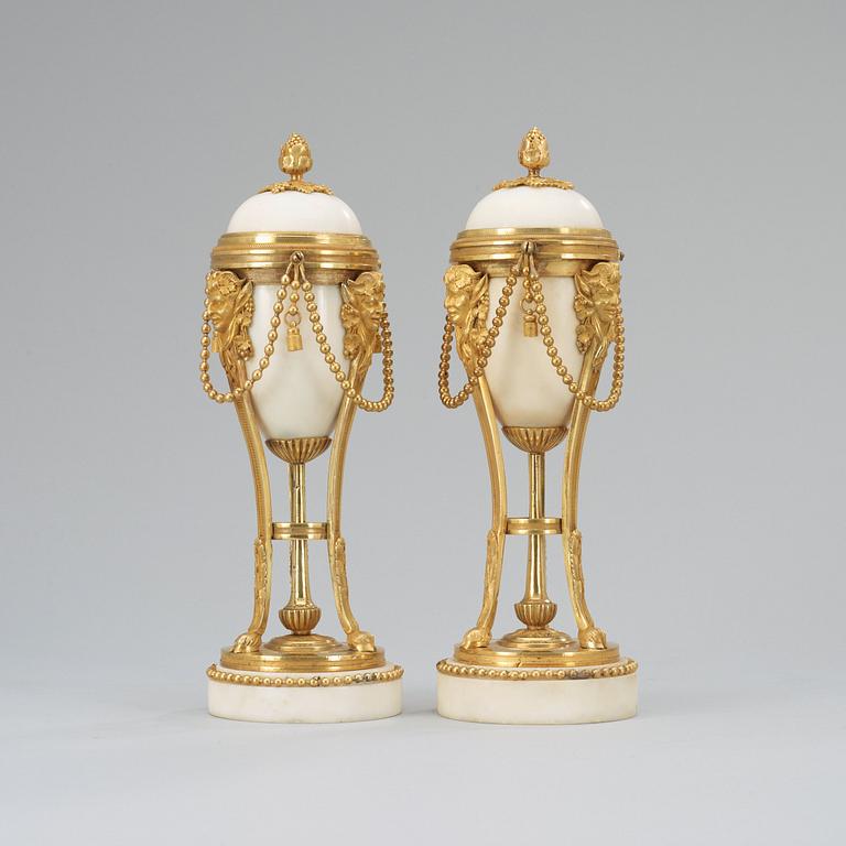 A pair of Louis XVI late 18th century candlesticks/cassolettes.